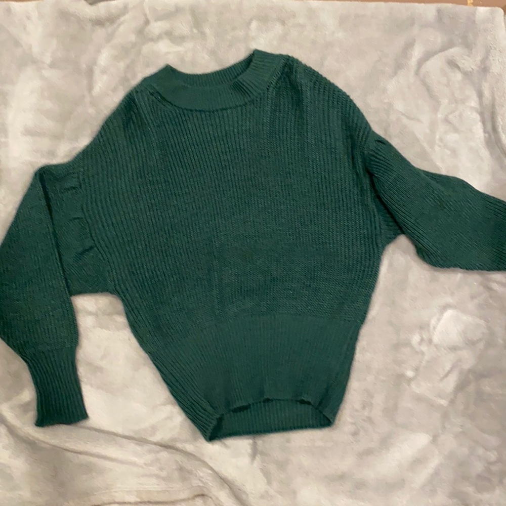 green sweater